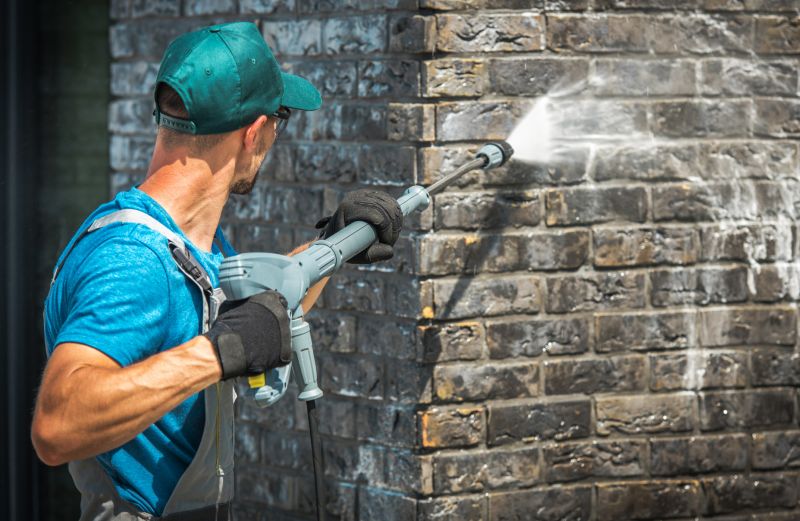 Local Brick Home Power Washing pros at work